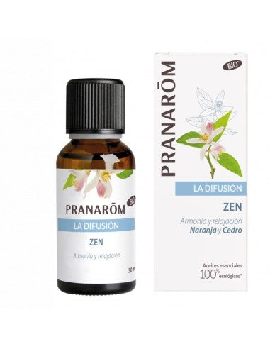 Botella de Pranarom Difusión Zen Bio con hierbas aromáticas y luz suave, simbolizando calma y bienes