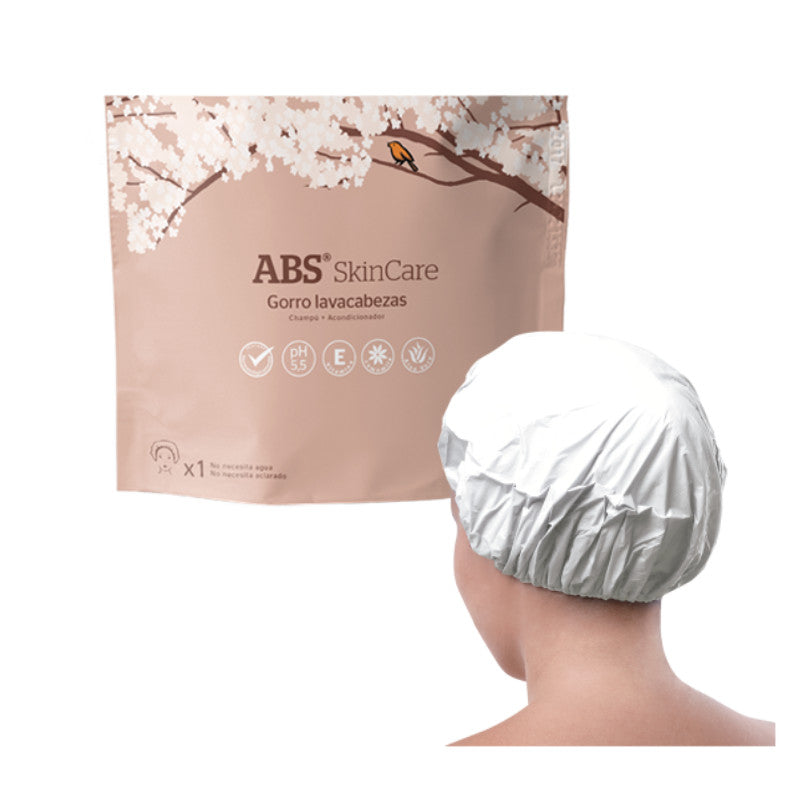 Gorro lavacabezas desechable de la marca Abs Skincare, para higiene capilar sin agua.