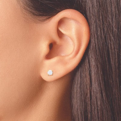Pendientes Inverness 24K 40C Solitario Pe de oro amarillo con un diamante solitario.