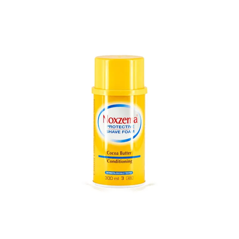 Espuma de afeitar Noxzema Protective Shave con manteca de cacao y vitamina E para pieles sensibles.